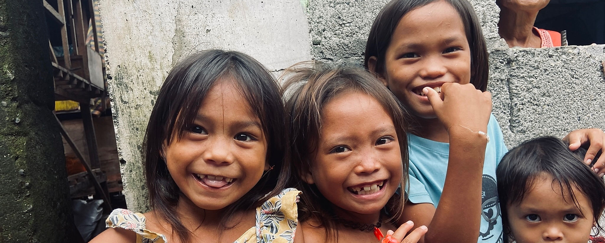 Children in a Filipino community served by Meeting TENTS